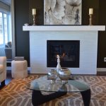 Living room with dark walls, white fireplace, and furniture, interior design problems, Michael Gainey Signature Designs