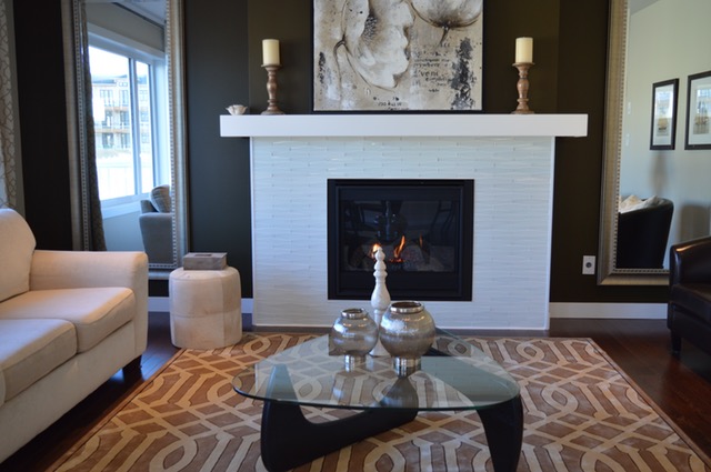Living room with dark walls, white fireplace, and furniture, interior design problems, Michael Gainey Signature Designs