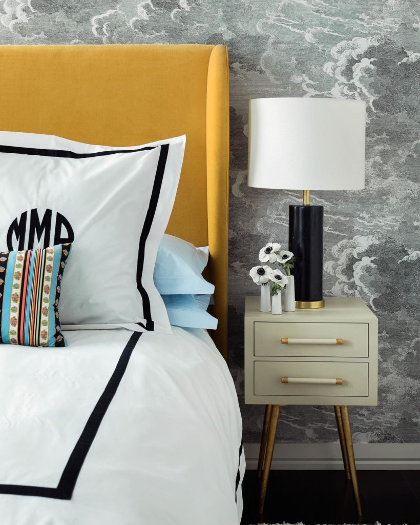 Bright yellow headboard in bedroom; interior design trends, High Point Market, MGSD