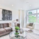 Contemporary living room in gray with abstract art; art interior design; MGSD
