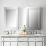 Two mirrors above bathroom vanity; mirror interior design