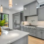 Gray kitchen with island; MGSD interior design Melbourne FL