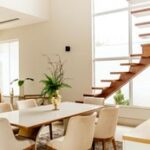 Open contemporary living space with neutral decor, contemporary interior design, Michael Gainey Signature Designs