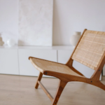 Rattan chair and sandals in beach house; coastal chic interior design; Michael Gainey Signature Designs