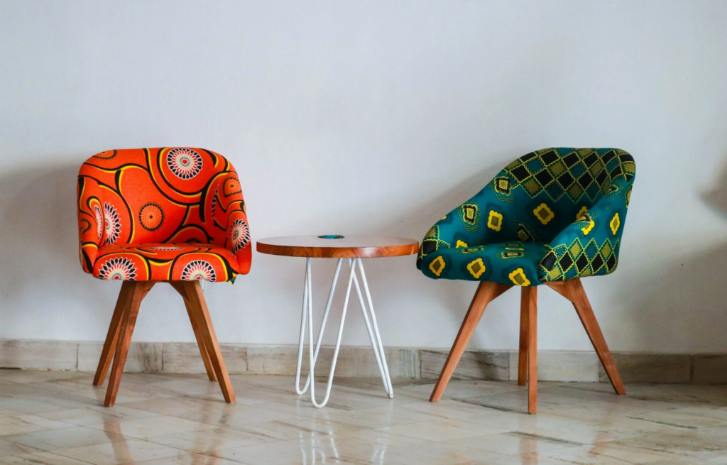 Vintage chairs in coordinating geometric prints; Michael Gainey Signature Designs, 1940s interior design trends 